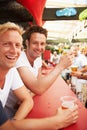 Happy man, friends and drinking at music festival, bar or event for summer party or DJ concert. Portrait of male person Royalty Free Stock Photo