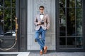 Happy man in funny glasses holding old vintage photo camera Royalty Free Stock Photo