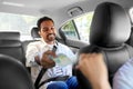 happy man giving money to taxi car driver Royalty Free Stock Photo