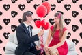 Happy man giving red balloons to woman Royalty Free Stock Photo