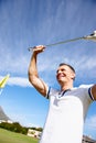 Happy man, golfer and celebration with club for winning, sports or goal on outdoor field or green grass. Excited male Royalty Free Stock Photo