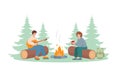 Happy man with guitar and woman relaxing near fire in forest. Tourist camping concept.