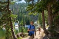 Happy man with his family on hiking trip in Colorado.