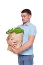 Happy man hold bags with healthy food, grocery buyer isolated Royalty Free Stock Photo