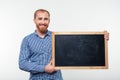 Happy man holding blank board Royalty Free Stock Photo