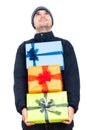 Happy man holding Christmas gift boxes Royalty Free Stock Photo