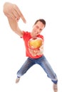 Happy man holding offering apple. Diet.