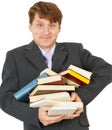 Happy man holding pile of books Royalty Free Stock Photo