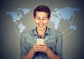 Happy man holding using smartphone connected browsing internet Royalty Free Stock Photo