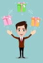 Happy man juggling gift box with bow Royalty Free Stock Photo