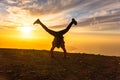 Happy man jumping for joy at sunset. Success, winner, happiness, ttavel concept Royalty Free Stock Photo