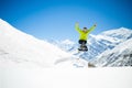 Happy man jumping in winter mountains Royalty Free Stock Photo