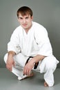 Happy man in karate suit Royalty Free Stock Photo