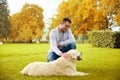 Happy man with labrador dog walking in city Royalty Free Stock Photo