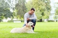 Happy man with labrador dog walking in city Royalty Free Stock Photo