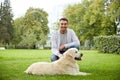 Happy man with labrador dog walking in city Royalty Free Stock Photo