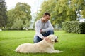 Happy man with labrador dog walking in city Royalty Free Stock Photo