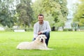 Happy man with labrador dog walking in city Royalty Free Stock Photo