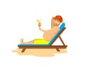 Happy man lying on sunchair, drinking cocktail, sunbathing. Royalty Free Stock Photo