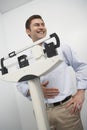 Happy Man Measuring Weight On Weighing Scale Royalty Free Stock Photo