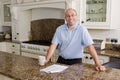 Happy man in modern kitchen Royalty Free Stock Photo