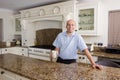 Happy man in modern kitchen Royalty Free Stock Photo