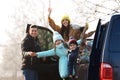 Happy man near modern car with his family Royalty Free Stock Photo