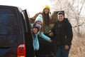 Happy man near modern car with his family Royalty Free Stock Photo