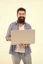 Happy man with notebook. Searching for new job. Bearded man using notebook. Bearded happy man surfing inet on notebook