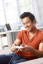 Happy man playing video game Royalty Free Stock Photo