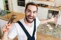 Happy man plumber work in uniform Royalty Free Stock Photo