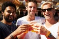 Happy man, portrait and friends cheers at music festival, bar or event for summer party or DJ concert. Male person or Royalty Free Stock Photo