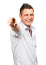 Happy man, portrait and pointing to you for decision, choice or pick on a white studio background. Isolated, handsome