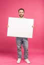 happy man posing with blank board, isolated Royalty Free Stock Photo