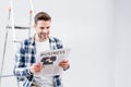 happy man reading newspaper with business Royalty Free Stock Photo