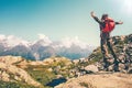 Happy Man with red backpack jumping hands raised Royalty Free Stock Photo