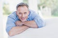 Happy man relaxing on the couch Royalty Free Stock Photo