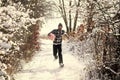 Happy man running with gift box Royalty Free Stock Photo