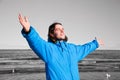 Happy man on the beach - b&w background. Overcoming depression