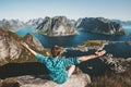 Happy Man success raised hands on cliff edge traveling Royalty Free Stock Photo