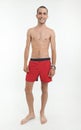 Happy man in swimming trunks