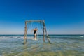 Happy man on swing in Sao beach Royalty Free Stock Photo