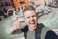 Happy man tourist taking selfie photo on background fountain Four rivers in Piazza Navona, Rome Italy Royalty Free Stock Photo