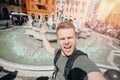 Happy man tourist taking selfie photo on background fountain Four rivers in Piazza Navona, Rome Italy Royalty Free Stock Photo