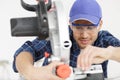 happy man using circular saw