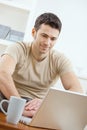 Happy man using computer Royalty Free Stock Photo