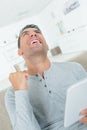 Happy man using digital tablet Royalty Free Stock Photo