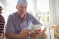 Happy man using mobile phone Royalty Free Stock Photo