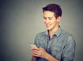 Happy man using mobile phone Royalty Free Stock Photo