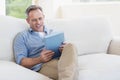 Happy man using tablet computer Royalty Free Stock Photo